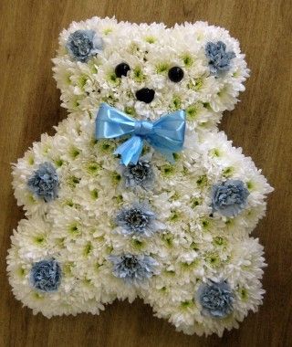 Blue teddy bear funeral tribute